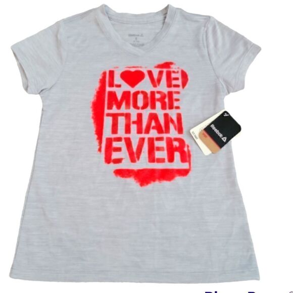 NWT GIRLS REEBOK V-NECK SHORT SLEEVE SPACEDYE "LOVE MORE THAN EVER" TOP SZ. S - Picture 1 of 4
